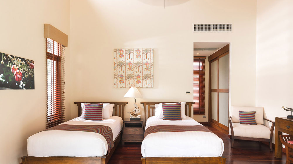 Tawantok Beach Villas - Airy, spacious, and restful guest bedrooms